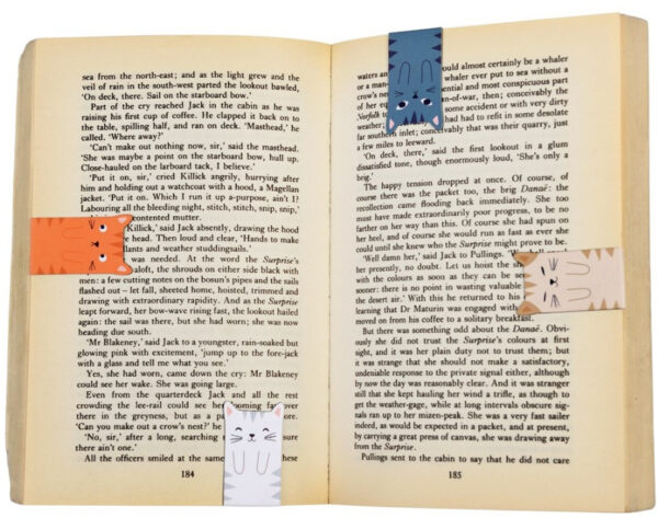 Magnetic Cat Bookmarks on a book