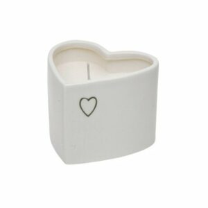 A ceramic heart-shaped candle pot with a heart decal on white background