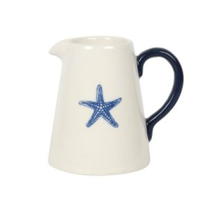 Starfish ceramic flower jug on white background